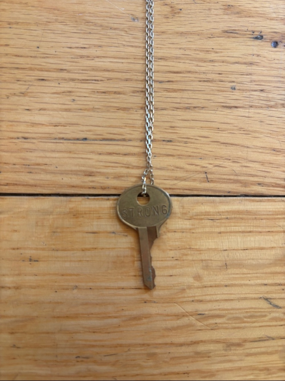 The Giving Keys Gold “Strong” Key Pendant Necklace